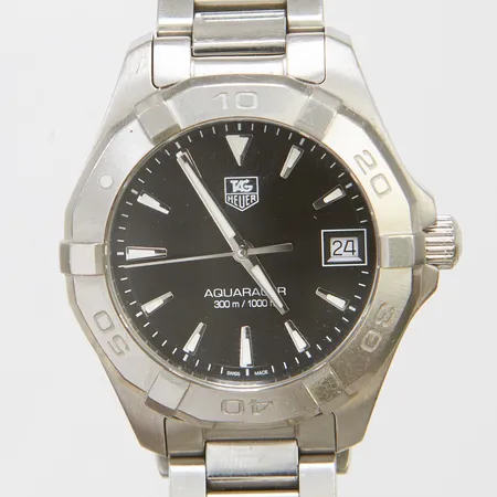 Damur Tag Heuer Aquaracer stål quartz 32,5mm, ref: WAY1310, snr: WKU5513, safirglas, datum, stållänk, viklås, repiga länkar, 