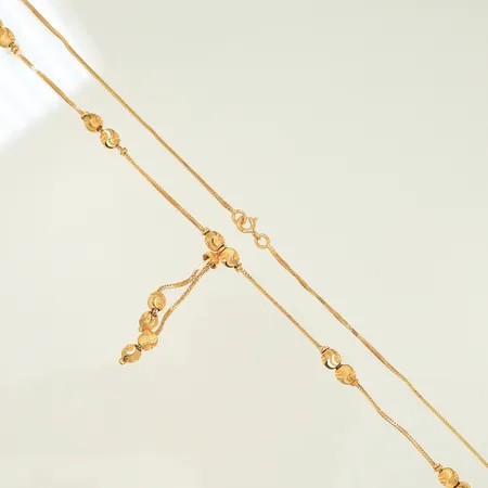 Halscollier med kulor längd 43,5cm, bredd 1-5mm, snurrade länkdelar, 21K, 8,5g Vikt: 8,5 g
