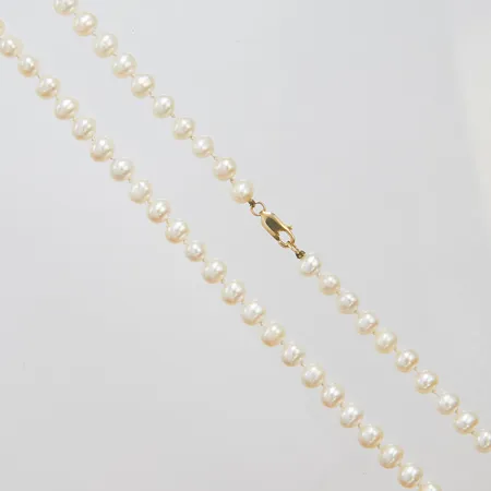 Pärlcollier längd 51,5cm Ø6-7mm, lås i 14K, bruttovikt: 23,4g.