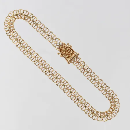 Armband X-länk med stav Guldfynd, längd 19,5cm bredd ca 6mm, ojämn länk, 18K Vikt: 6,2 g