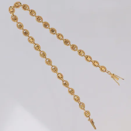 Armband längd 20,5cm, bredd 4,8mm, importstämplat 18K Vikt: 6,5 g