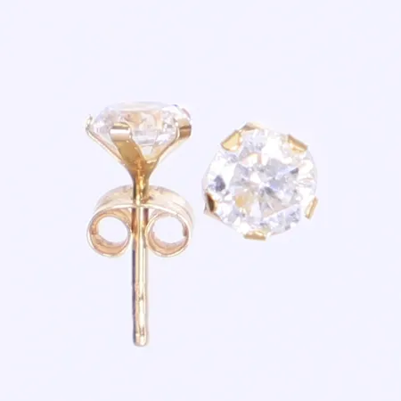 Ett par örhängen med vita stenar, 11x4mm, skeva stift, 18K Bruttovikt: 0,7g 