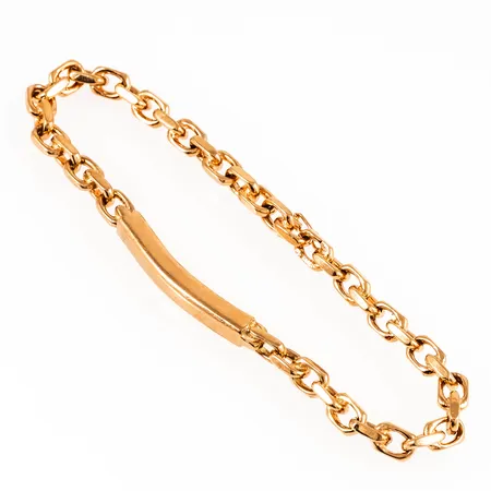 Armband i 18K guld: Ankarlänk med stav. Det är 23 cm långt, 5 - 5,5 mm brett och väger 35,5g. Stämplad D10 (1978), ALTON, Falköping, 18K, kattfot. Bruksslitage. 