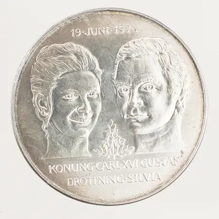 Minnesmynt Bröllopet mellan Konung Carl XVI Gustaf och Drottning Silvia, 19 juni 1976, 50kr, Ø36mm, 925/1000 silver  Vikt: 27 g