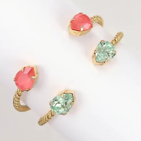 Två armband Caroline Svedbom Ø60mm, gulmetall, glasstenar, mindre skevheter, inga tillbehör