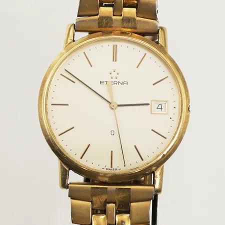 Armbandsur Eterna, 18K, Ø33mm, quartz, defekt, saknar krona, datum, gravyr, länk i stål, defekt