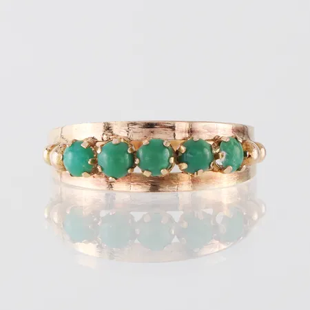 Ring 14k med stenar,storlek 19 mm,bredd 2.4-6.4 mm. Vikt: 1,7 g