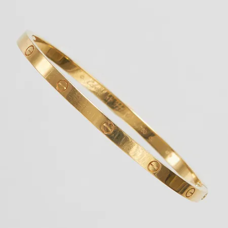 Armband Cartier Love Bracelet Small Model, stl17, innermått 56x47mm, bredd 3,5mm, refnr CRB6047517, serienr 727AHZ, 18K, repor, reseetui, certifikat samt kvitto från Cartier Stockholm 2024. Vikt: 19,5 g