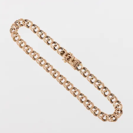 Armband 18k Bismarck,slitage,längd ca 18.5 cm,bredd 5.2 mm. Vikt: 9,5 g