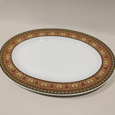 Uppläggningsfat Medusa Red, Versace Rosenthal, längd ca 34cm, bredd ca 25cm, märkt undertill Rosenthal Versace Medusa Skickas med paket.