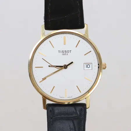 Herrur Tissot, 14K, 33,5mm, quartz (går ej), saknar glas, defekt visare, svart läderband med slitage, inga tillbehör 