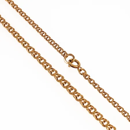 Collier Bismarck i 18K guld. Det är 46 cm långt, 3 - 4,5 mm brett och väger 10,3g. Springring. 