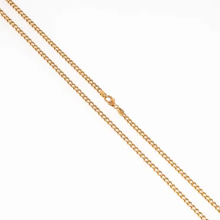 Kedja ihålig Pansar i 18K guld. Den är 47,5 cm lång, 3 mm bred och väger 4,6g. Karbinhake.