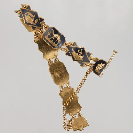 Armband plattor med emalj, längd ca 19,5cm, bredd ca 14mm, säkerhetskedja, bruksslitage, ostämplad, minst 21K Vikt: 37,5 g