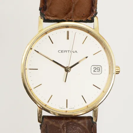 Armbandsur Certina, 14K, 33,5mm, quartz, boettnummer EOL 158.9289.65, datum, personlig gravyr, repig, står still, brunt läderband, slitet band, inga tillbehör 