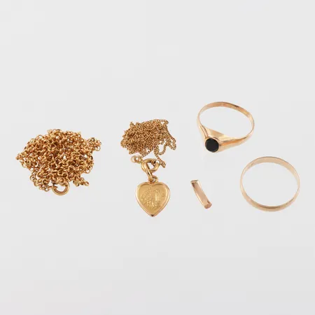 Diverse guld 18k med gravyr defekter/slitage. Vikt: 16,2 g