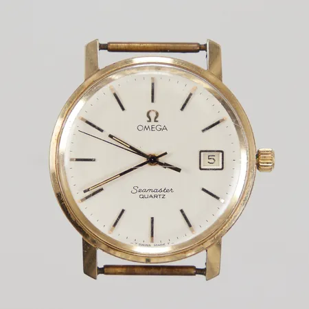 Herrur, Omega Seamaster, Ø34,5mm, 14K, kvarts, boettnr: 1181, 1964010, cal. 1342, datum, repigt plexiglas, gravyr, batteri krävs, batterifäste saknas, defekt urverk, utan band, inga tillbehör, Bruttovikt: 32,4g.