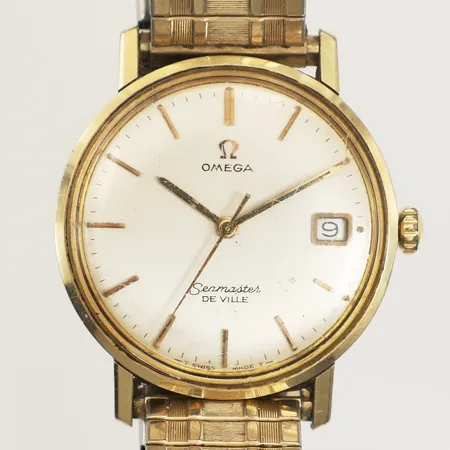 Armbandsur Omega Seamaster De Ville, manuell, 34mm, datum, guld på stål, monocoque, personlig gravyr på bakboett, repigt glas/ boett, flexlänk, inga tillbehör