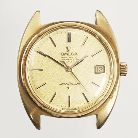Herrur Omega Constellation, guld på stål, automatisk, 35mm, datum, repigt plexiglas och boett, armband saknas, inga tillbehör. 