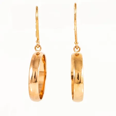 Örhängen i 18K guld: Hängande ringar på krok Ø 17,5 mm. De är 34 mm långa och väger 5,0g.