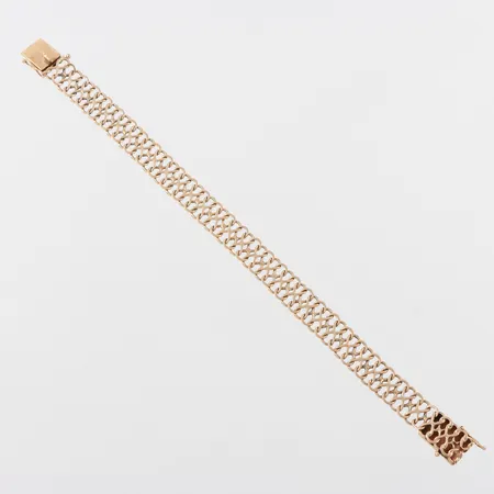 Armband 18k,längd ca 18.5 cm,bredd 9.8 mm. Vikt: 14,5 g