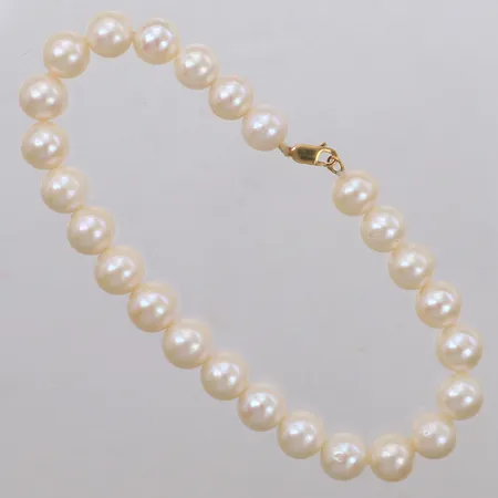 Armband med odlade pärlor Ø7,6-8,1mm, ej knutet, lås i 18K  Vikt: 17,7 g