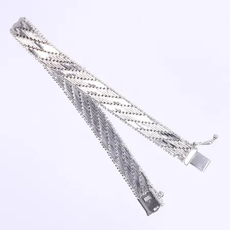 Armband flätat längd 19cm bredd 8mm silver 830/1000  Vikt: 23,4 g