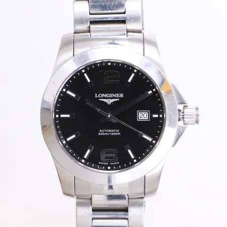 Herrur Longines Conquest, ref-nr L3.658.4, serie-nr 35340698, Ø41mm, automat, stållänk, repig, innermått ca 19cm, inga tillbehör