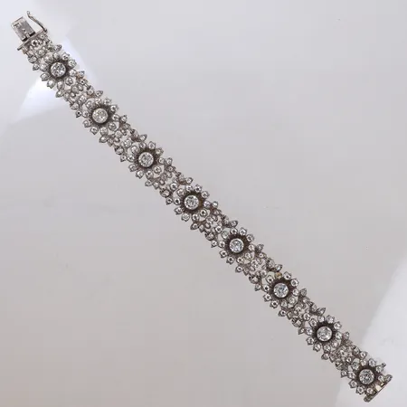 Armband med vita stenar, längd 18cm, bredd 14mm, stenar saknas, graverat "H" vid lås, silver 830/1000 Vikt: 25,9 g