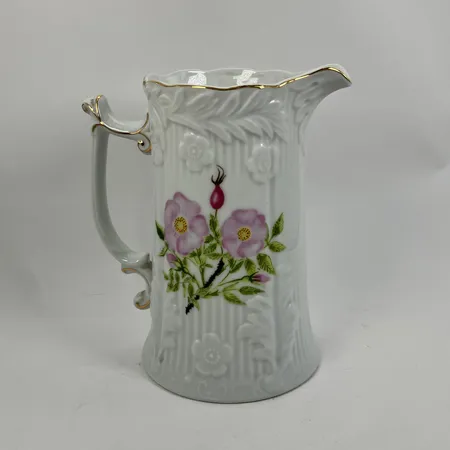 Kanna Rosenhof, höjd ca 18cm, med nyponrosor och gulddetaljer Skickas med paket.