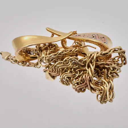 Diverse defekt guld, 18K, vikt 25,27g.