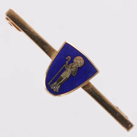 Brosch med blå emalj, längd 32,3mm, bredd 1,9-9,8mm, defekt, 18K Vikt: 3 g