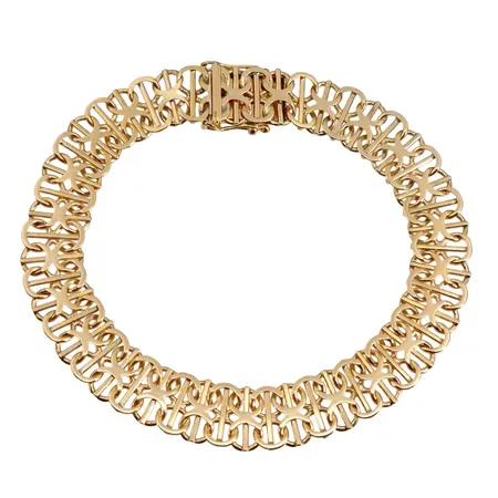 Armband X-länk 18K guld N S E Guldvaru Ab, Köping, svensk kontrollstämpel, längd knäppt 20,5 cm, bredd 10,5 mm, fint skick  Vikt: 18,4 g