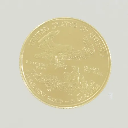 Guldmynt Amerikansk Gold Eagle, diam 16,5 mm 22K 1/10 oZ  Vikt: 3,4 g