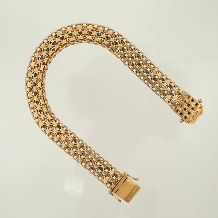 Armband X-länk, längd 19cm, bredd 6mm, sliten, 18K, 21,2g Vikt: 21,2 g