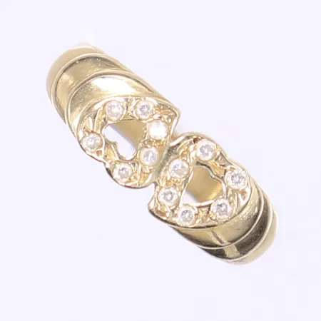 Ring med vita stenar stl 17¾ bredd 3-7mm, skev skena, 14K  Vikt: 3,3 g