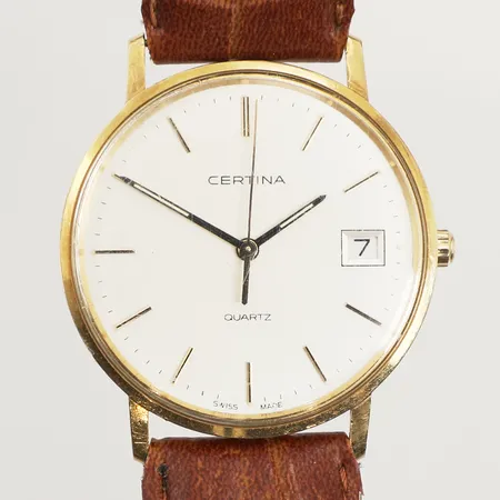 Armbandsur Certina, 18K, 33,5mm, quartz, boettnummer EOL 115.9299.68, datum, personlig gravyr, repig, står still, brunt läderband,  inga tillbehör 