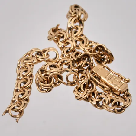 Defekt guld, 18K, vikt 8,22g.