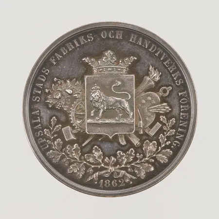 Medalj, Upsala stads fabriks och handtverks förening, 1862, För flit och arbetsskicklighet, bed och arbeta, personlig gravyr, etui, 925/1000 Silver 29,2g.