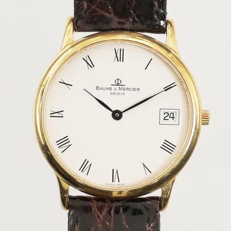 Armbandsur Baume & Mercier, 18K, 33mm, quartz, boettnummer 3443549 MVD46077, datum, repig, står still, brunt präglat läderband, inga tillbehör