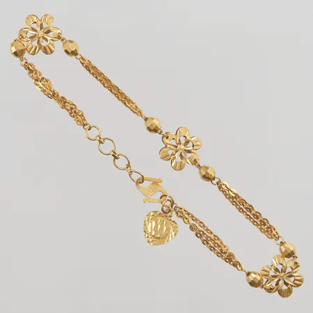 Armband 17,5-19cm, bredd:3-10mm, 18K 4,8g.