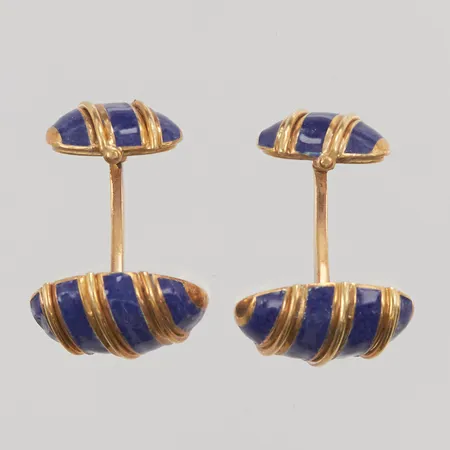 Ett par manschettknappar, blå emaljdekor, 16x12mm, naggad emalj, 18K 11,7g.