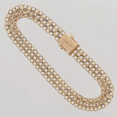 Armband x-länk 19,5cm, bredd:8mm, något skeva länkar, 18K 9,1g.