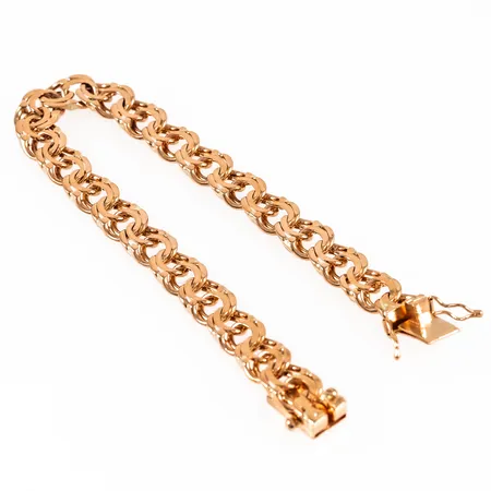 Armband bismarck i 18K guld. Det är 18,5 cm långt, 8 mm brett och väger 18,5g. Kistlås. Tillverkat 1962 av Ädelsmycken Aktiebolag i Stockholm. Fint skick.