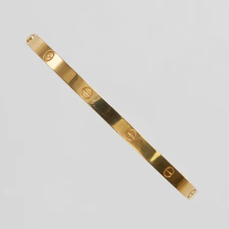 Armband Cartier Love Bracelet Small Model, stl17, innermått 56x47,5mm, bredd 3,5mm, refnr CRB6047517, serienr 864ALQ, 18K, mindre repor, certifikat samt kvitto från Cartier Short Hills 2024. Vikt: 19,5 g