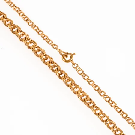 Collier Bismarck i 18K guld. Det är 45 cm långt, 3 - 6 mm brett och väger 12,3g. Springring. 