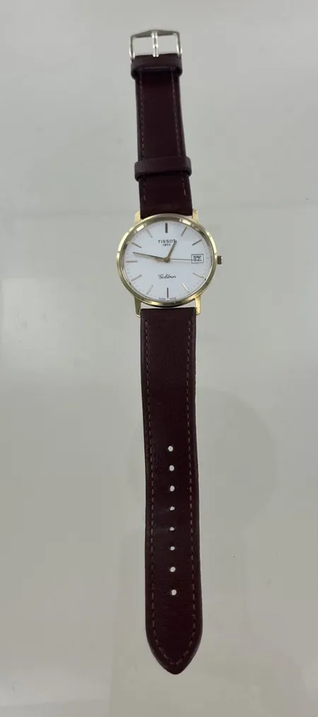 Herrur Tissot Goldbrun, diam 33 mm, repor, på baksidan, 18K