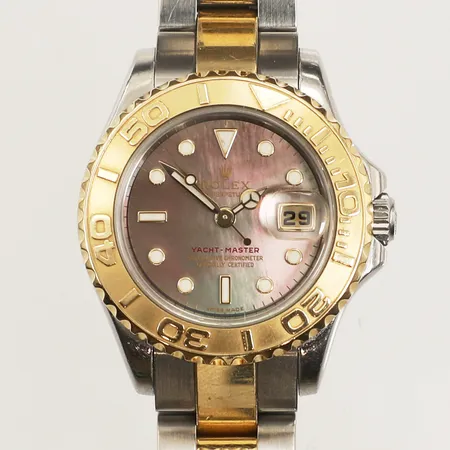 Damur Rolex Yacht-Master, stål/ guld, automatisk, datum, 29mm, referensnummer: 169623, serienummer: D384233, calnr. 2235, verknummer: 2068943, boettnummer: 2270, ej certifikat, bruksskick, repig länk, box, ytterkartong, kvitto från Kaplans år 2019