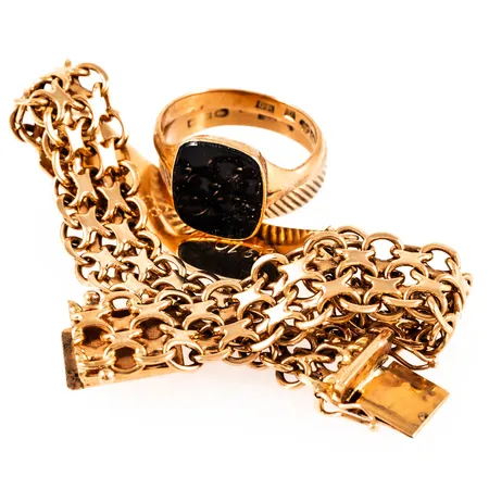 Diverse defekt/graverat guld i 18K. Vikt: 38,7g.