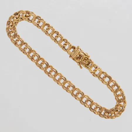 Armband Bismarck, längd ca 19,5cm, bredd 6mm, Clareus Guldsmeds Ab, år 1986, slitage, 18K Vikt: 15 g
